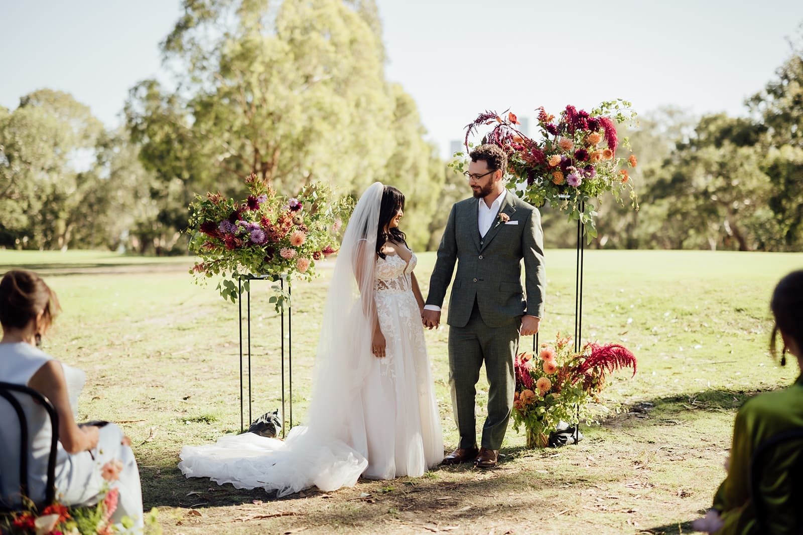 Melbourne-Wedding-Couple-at-Studley-Grounds-Standing-In-Front-of-Arbor-Photographed-by-Liz-Barnes